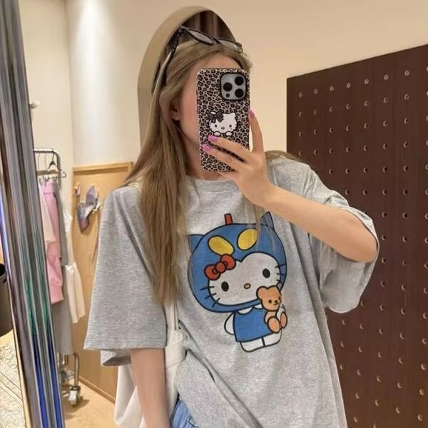 Street Fashion Us - 半袖ハローキティプリント Tシャツサンリオレディース夏新作ルーズデザイン多用途純綿トップス楽しいストリートファッション